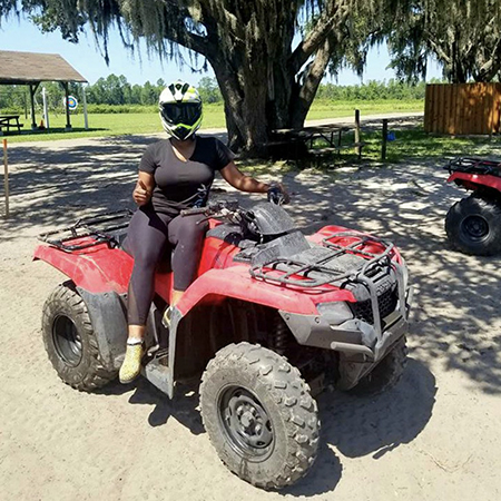 woman on a 4-wheeler