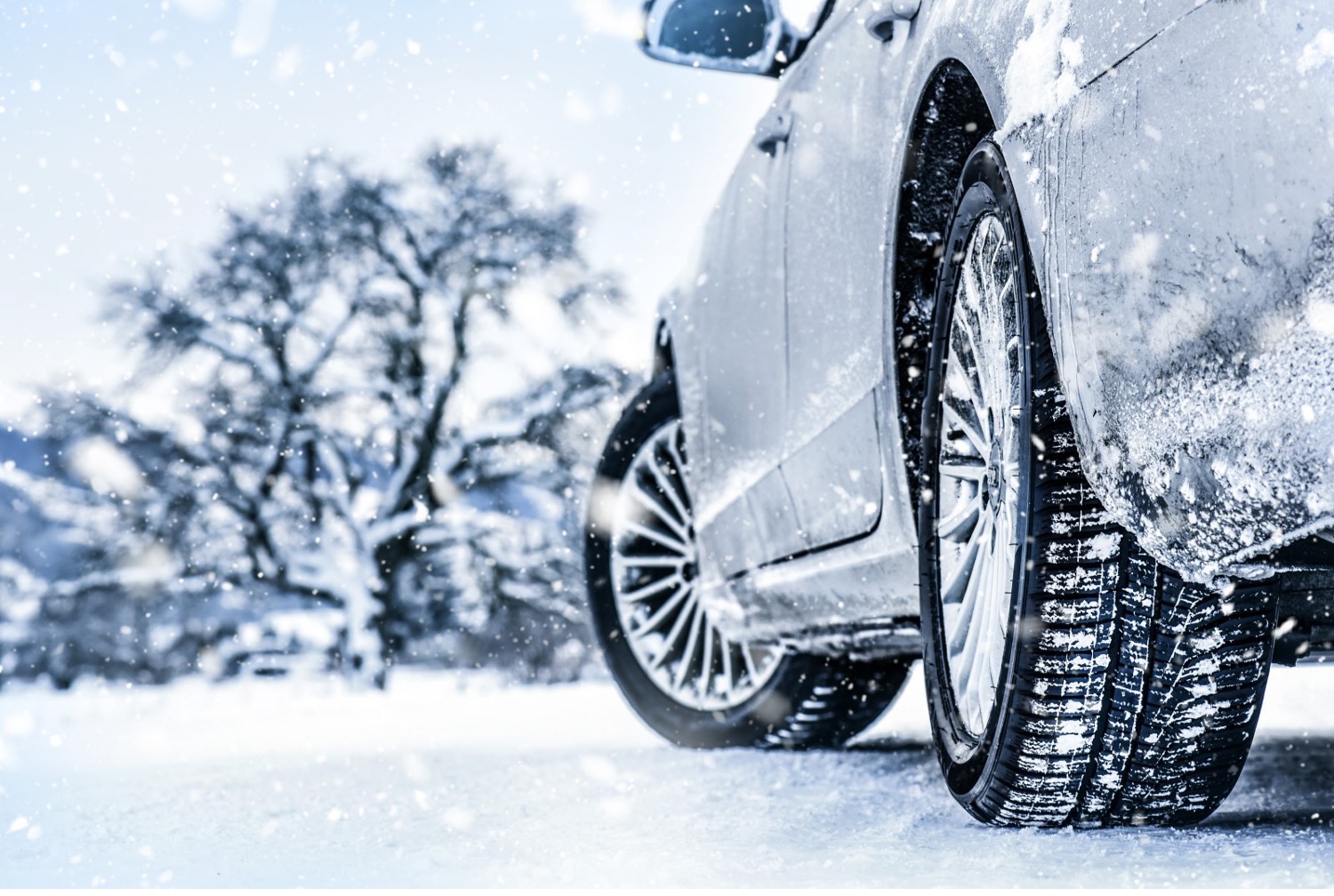Car tires driving in snow