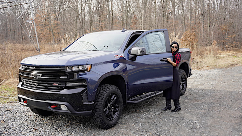 Woman getting into a Chevrolet Truck