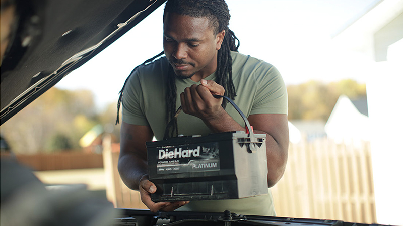 Man with Diehard Battery