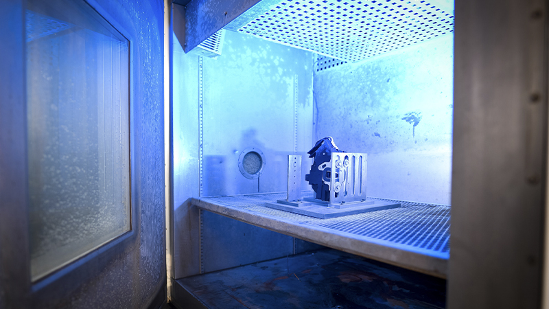 A Dorman door lock actuator in a testing chamber