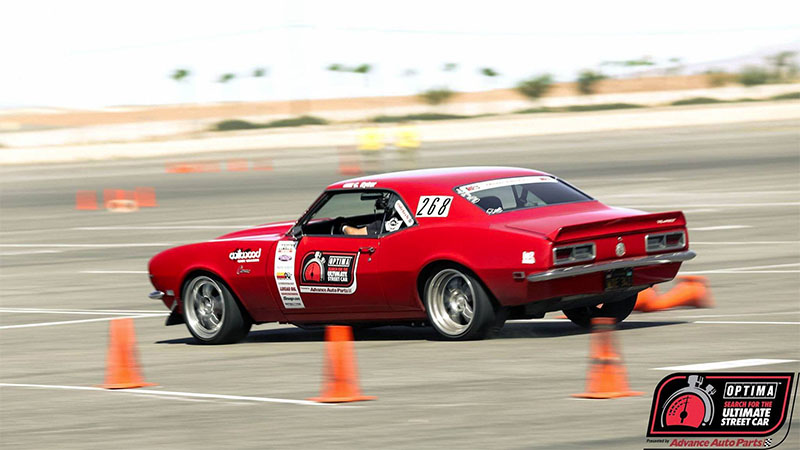 A car on an Optima Ultimate Street Challenge track 