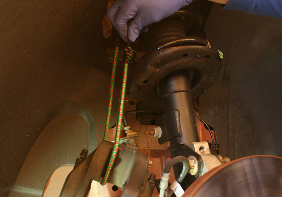 secure caliper out of the way