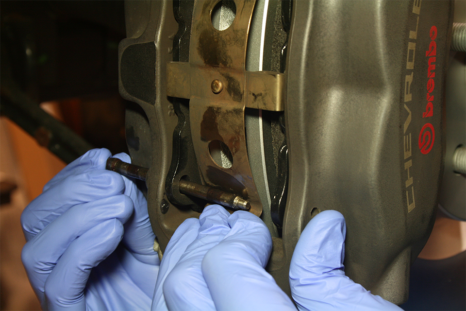 pushing in caliper pins