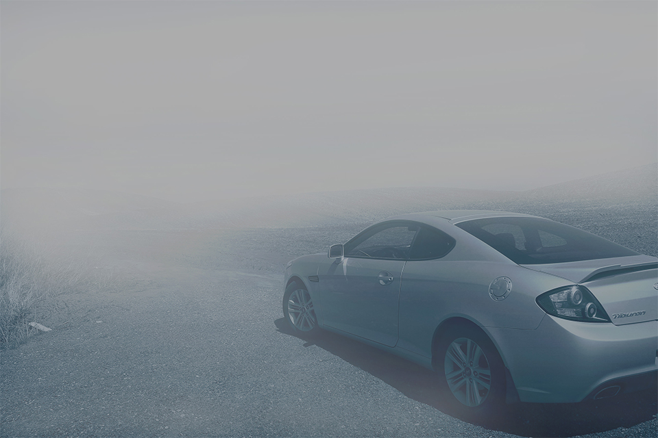 car in fog