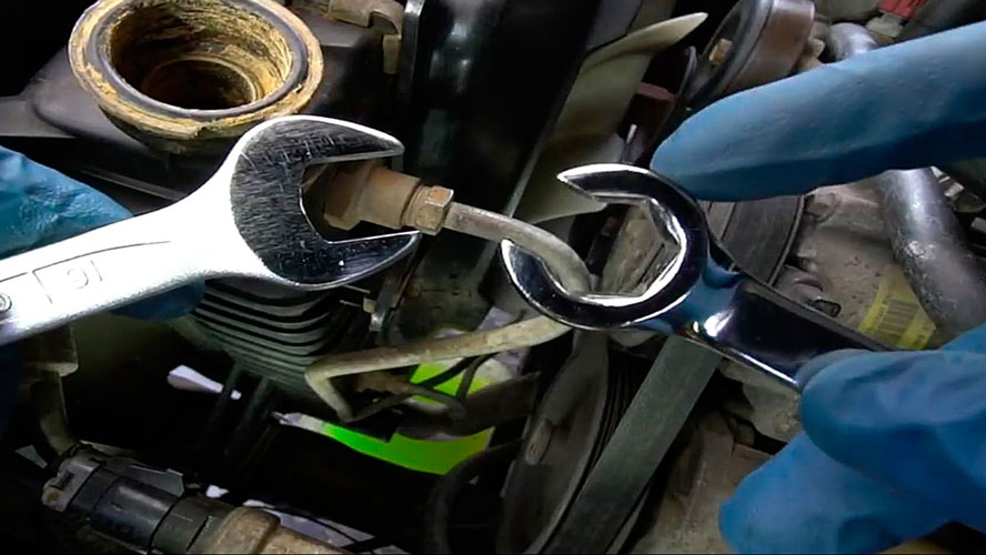 Remove the transmission cooling lines