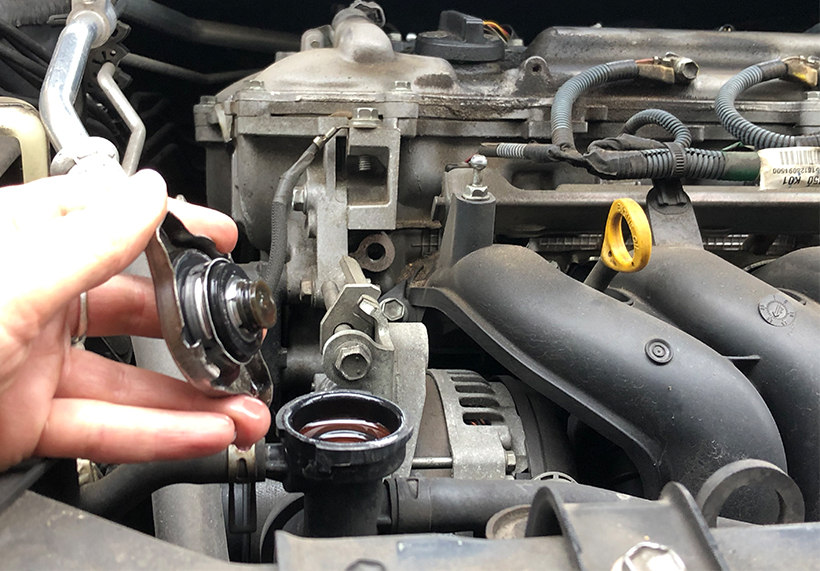 checking coolant level