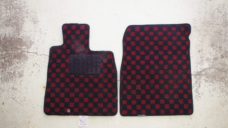 two floor mats placed on garage floor