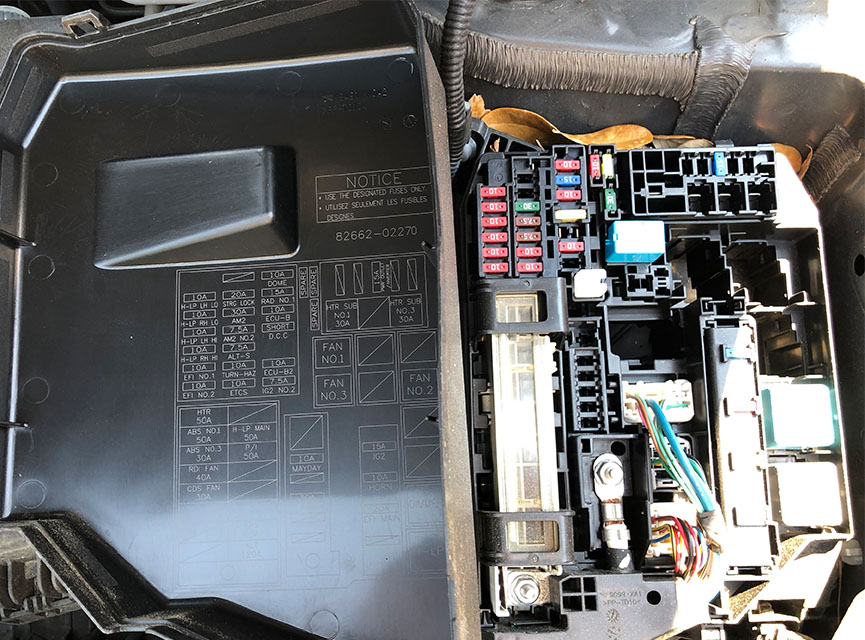 fuse panel with labels inside cover