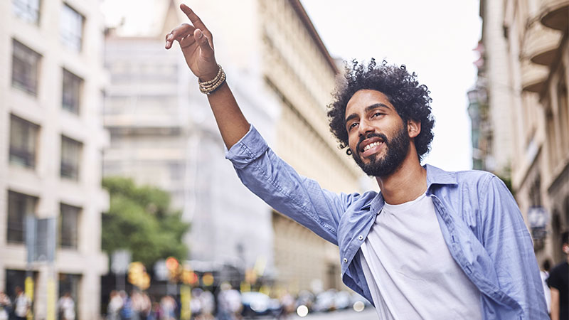 a man hailing a ride