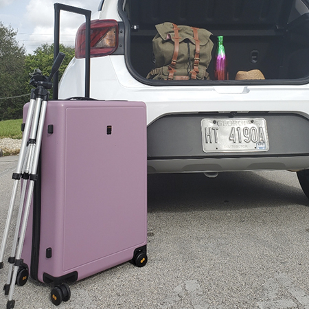 luggage being packed in an SUV