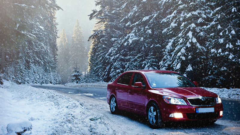 red car in snow