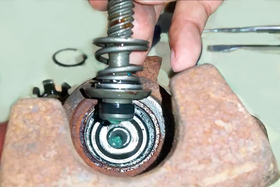 rear caliper disassembly