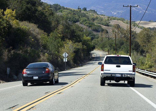 car trying to pass another