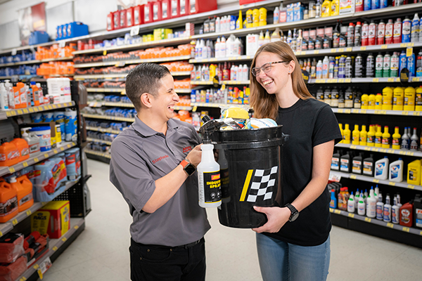 general manager giving Amber wash and wax supplies