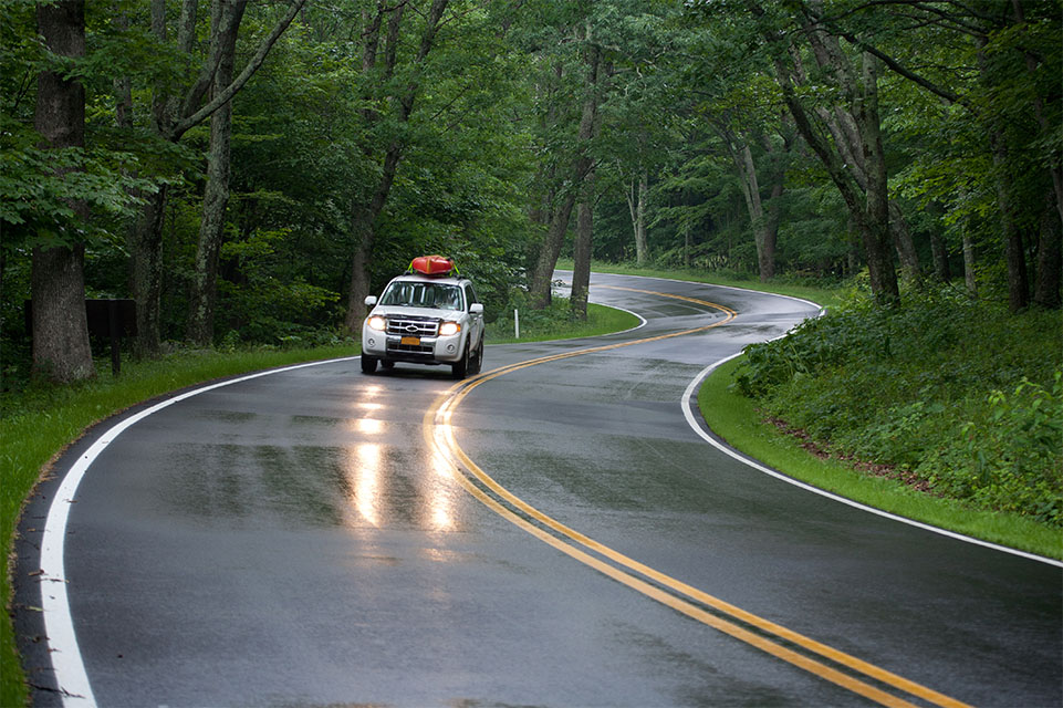 SUV on wet road