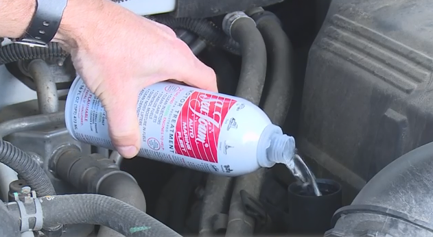 Sea Foam motor treatment being applied