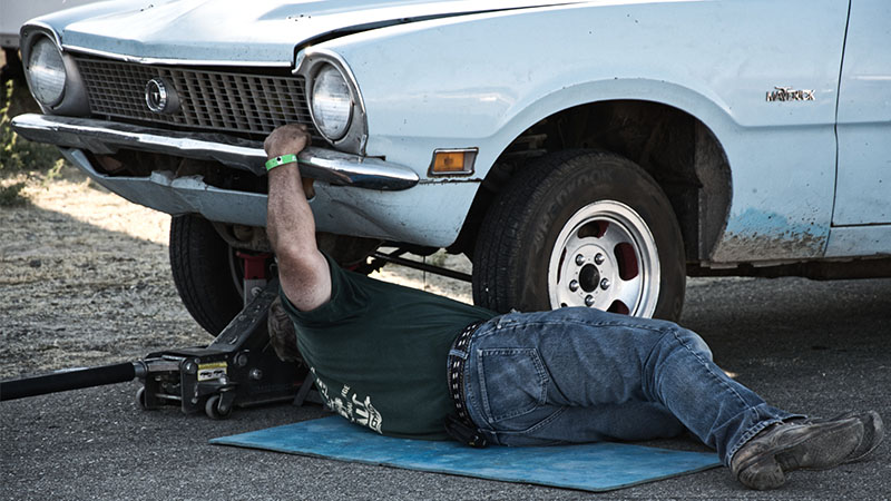 Man Working on Vehicle